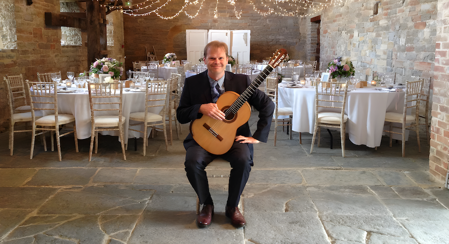 Jon Pickard wedding guitarist ready to play for in wedding reception room